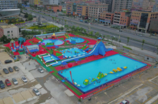 nuestra empresa creó un nuevo parque acuático inflable gigante en tierra para alquilar en la ciudad de dongguan