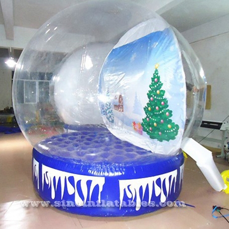 human giant inflatable Christmas snow globe