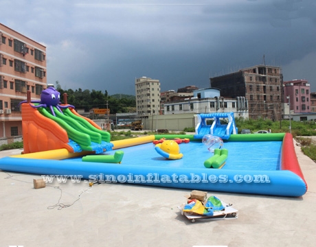 kids N adults large inflatable water park on land with big inflatable pool