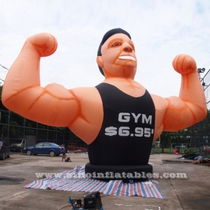 publicidad de gimnasio inflable fitness muscle man