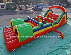 Carrera de obstáculos inflable arco iris para niños de 11 metros de largo